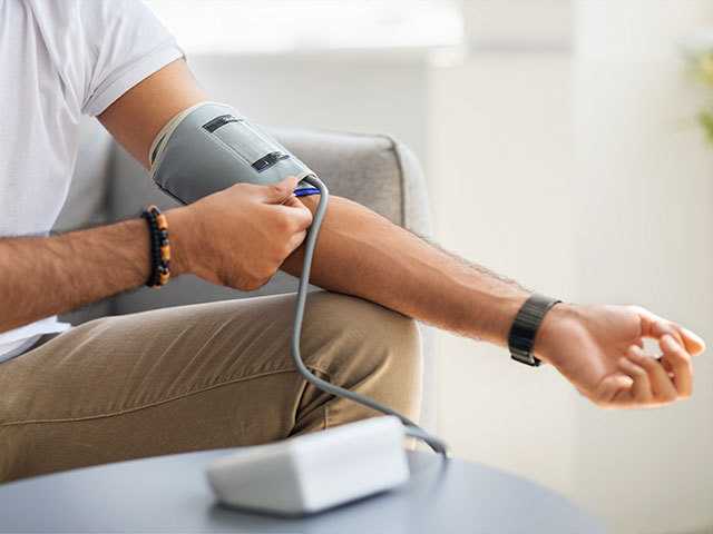 Person getting their blood pressure taken