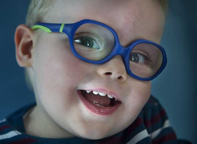 Little boy in glasses.