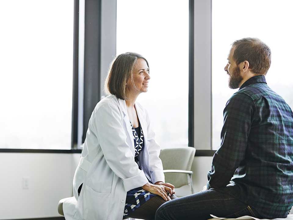 Doctor Hugging Patient